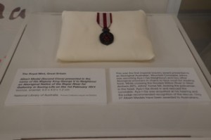 Military medal, history in Darwin Parliament building