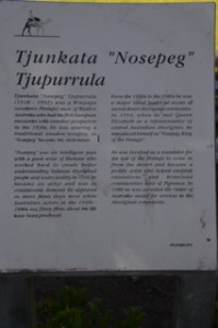 Poster in Alice Springs about Tjunkata 'Nosepeg" Tjupurrula