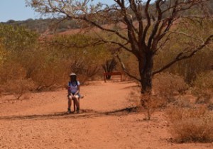 Christie Adams sat under a tree at Uluru